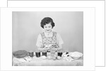 Woman Coloring Easter Eggs by Anonymous