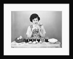 Woman Coloring Easter Eggs with a Paintbrush by Anonymous