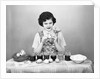 Woman Coloring Easter Eggs with a Paintbrush by Anonymous