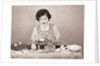 Woman Coloring Eaaster Eggs/Egg On Spoon by Anonymous