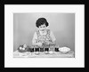 Girl Coloring Easter Eggs by Corbis