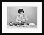Girl Coloring Easter Eggs by Anonymous