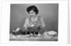 Girl Coloring Easter Eggs by Anonymous