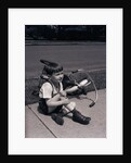 Boy Fallen Off Tricycle and Holding Knee by Anonymous