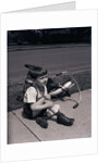 Boy Fallen Off Tricycle and Holding Knee by Anonymous