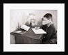 Boy Writing at Desk by Anonymous