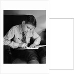 Seated Boy Doing Homework by Anonymous
