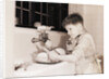 Boy Washing Dishes by Anonymous