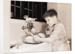 Boy Washing Dishes by Anonymous