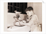 Boy Washing Dishes by Anonymous