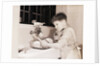 Boy Washing Dishes by Anonymous