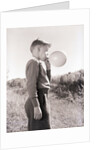 Boy Blowing a Balloon by Anonymous