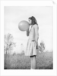 Girl Blowing a Balloon by Anonymous