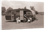 Women Gather Outside Trailer Home by Anonymous