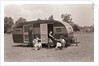 Women Gather Outside Trailer Home by Anonymous