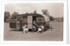 Women Gather Outside Trailer Home by Anonymous