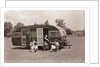 Women Gather Outside Trailer Home by Anonymous