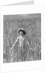 Girl Standing in Wheat Field by Anonymous