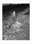 Little Girl Raking Leaves by Anonymous