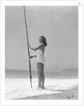 Woman Fishing on Surf by Anonymous