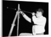 Boy Looking Through a Telescope by Anonymous