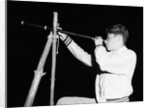 Boy Looking Through a Telescope by Anonymous