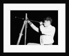 Boy Looking Through a Telescope by Anonymous