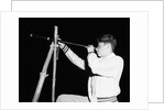 Boy Looking Through a Telescope by Anonymous