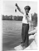 Boy Holding a Small Fish by Anonymous