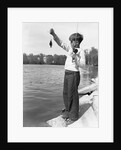 Boy Holding a Small Fish by Anonymous