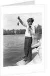 Boy Holding a Small Fish by Anonymous
