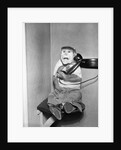 Monkey in Clothing Holds Phone Receiver by Anonymous