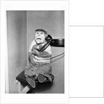 Monkey in Clothing Holds Phone Receiver by Anonymous