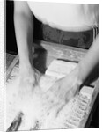 Person Using Washboard by Anonymous
