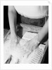 Person Using Washboard by Anonymous