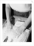 Person Using Washboard by Anonymous