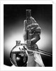 Hand Holding Test Tube by Anonymous