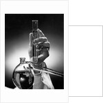 Hand Holding Test Tube by Anonymous