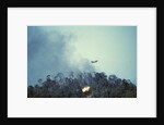 US Plane Dropping Bombs on Hill 875 by Corbis