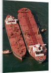 Tanker Pumps Oil from Exxon Valdez by Anonymous