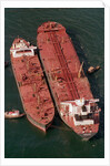 Tanker Pumps Oil from Exxon Valdez by Anonymous