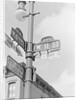 Street Light With Signs by Anonymous