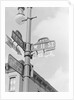 Street Light With Signs by Anonymous