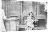 Children Sitting in a Doorway by Anonymous