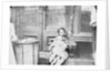 Children Sitting in a Doorway by Anonymous