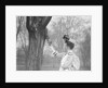 Woman Feeding a Squirrel by Anonymous