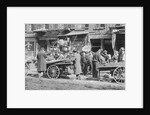 People Shopping Around Push Cart by Anonymous