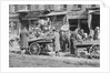 People Shopping Around Push Cart by Anonymous