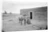 Women and Child Outside Ranch House by Anonymous
