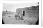 Women and Child Outside Ranch House by Anonymous
